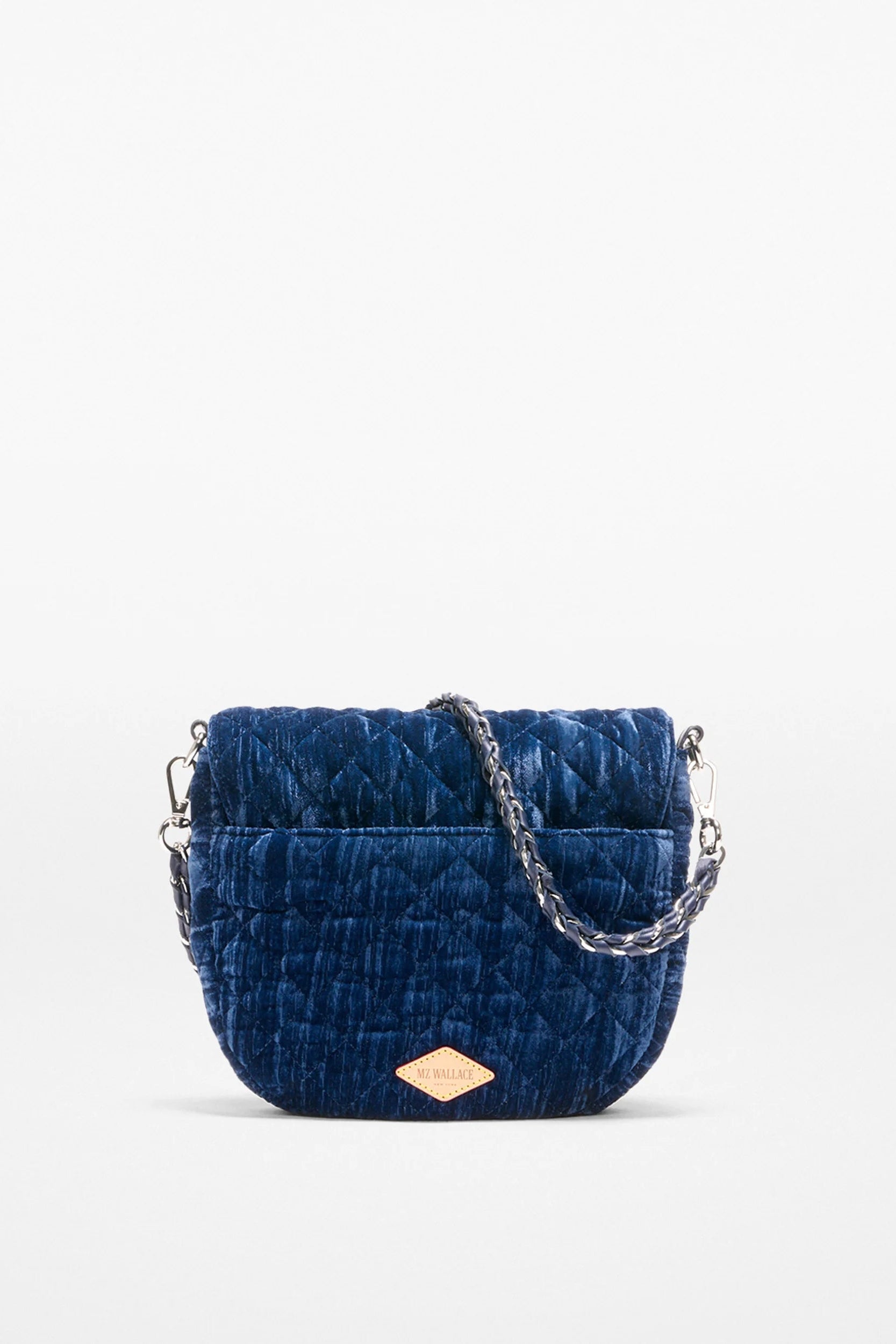 Blue textured handbag with a detachable chain crossbody strap