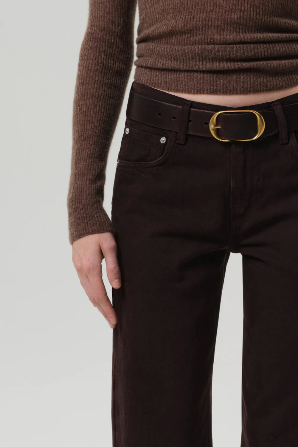 a low-rise, straight rigid denim jean in brown