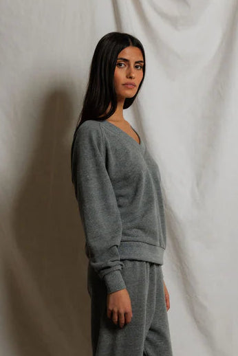 grey v-neck sweatshirt