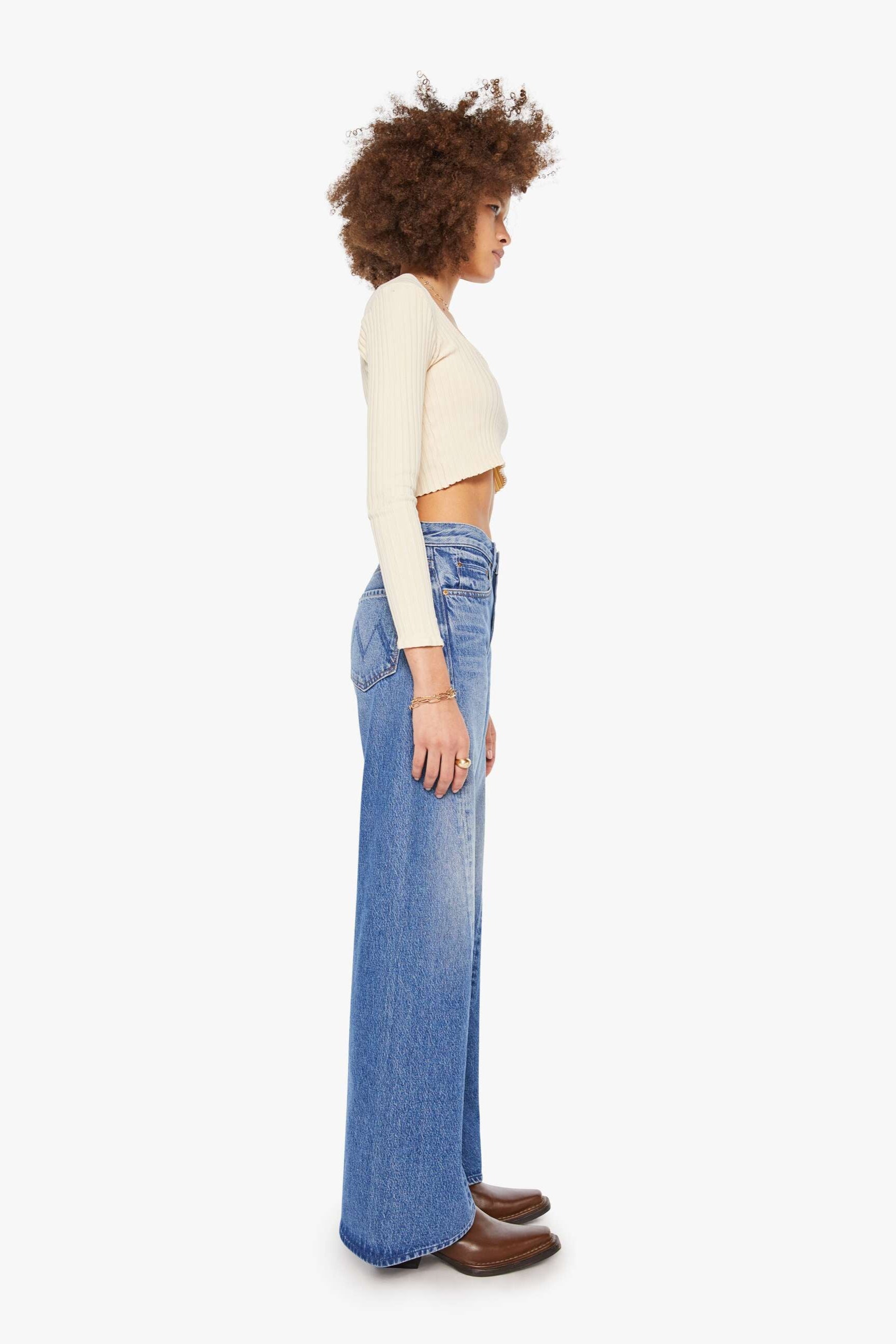 Mother Denim Lemon Twist Sneak High Rise Flared Jeans in Mid Wash Blue | Shop Eleanor - Women's Online Clothing Boutique