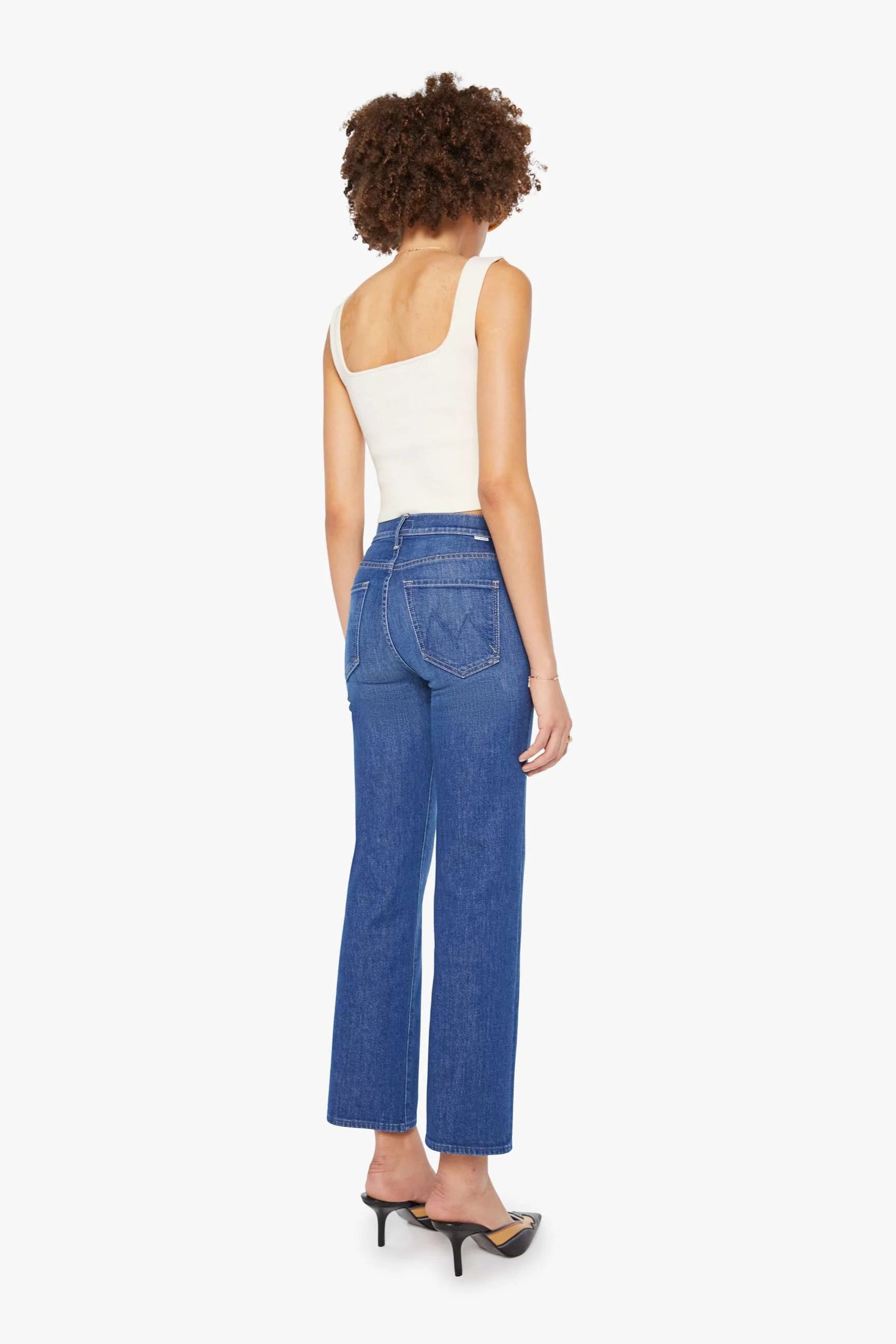 Mid-blue wash straight leg denim jean with a slight flare | Shop Eleanor- Women's Designer Clothing Boutique in Louisville, CO