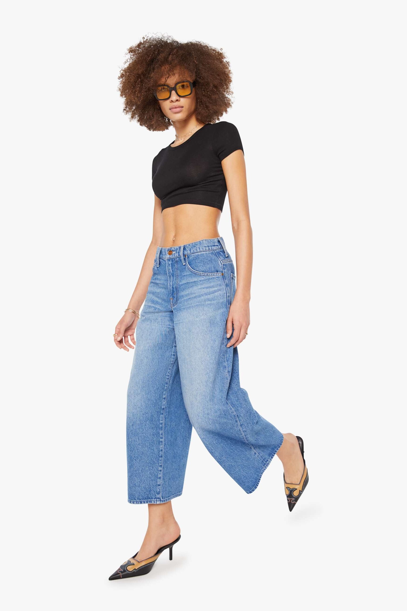 Wide leg baggy blue jeans by MOTHER, crafted from slightly rigid denim that keeps its shape