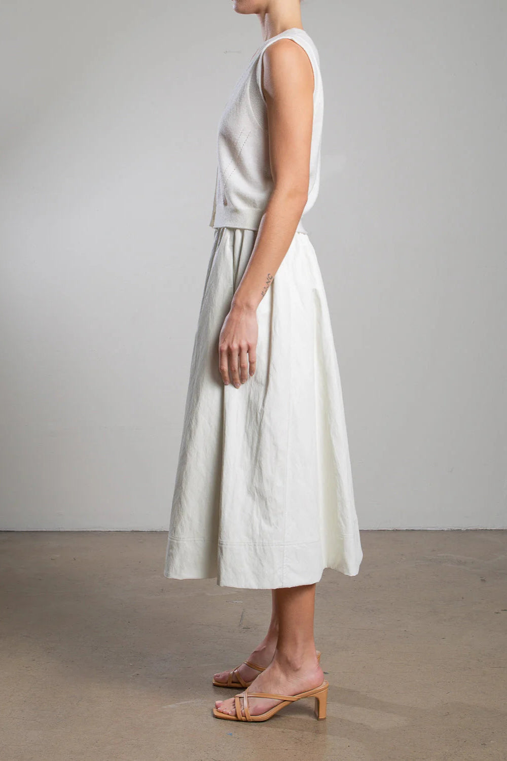 The Pharaoh Claudia Skirt in Ivory Faux Leather | Shop Eleanor - Women's Designer Clothing Boutique near Denver