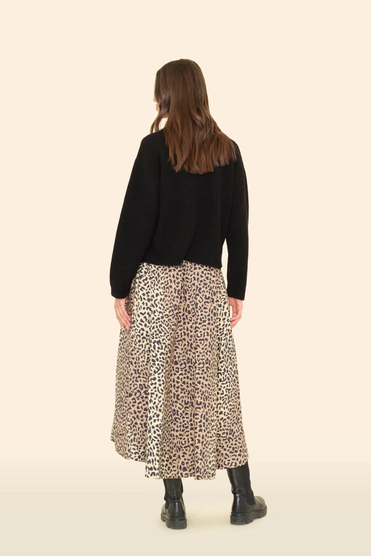 Leopard print ankle length midi skirt made from cotton. A skirt that pairs well with sneakers or boots.